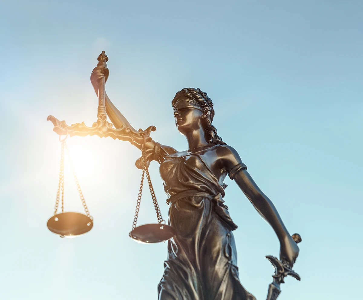 Lady justice. Statue of Justice on sky background